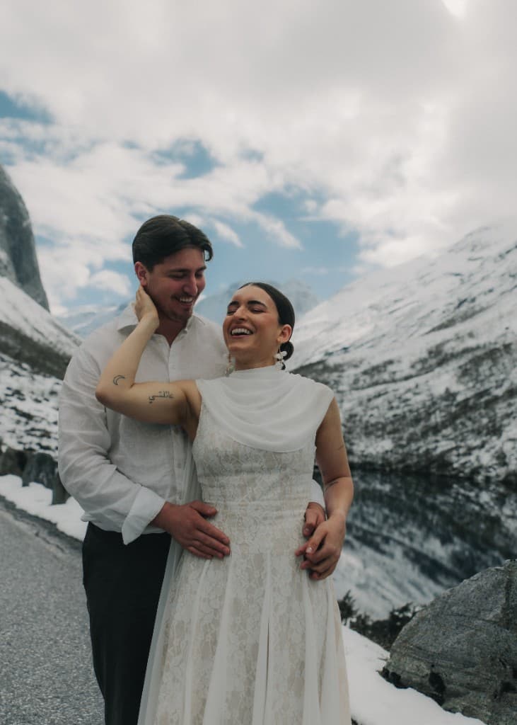 Styled wedding shoot — couple laughing on location in Stranda