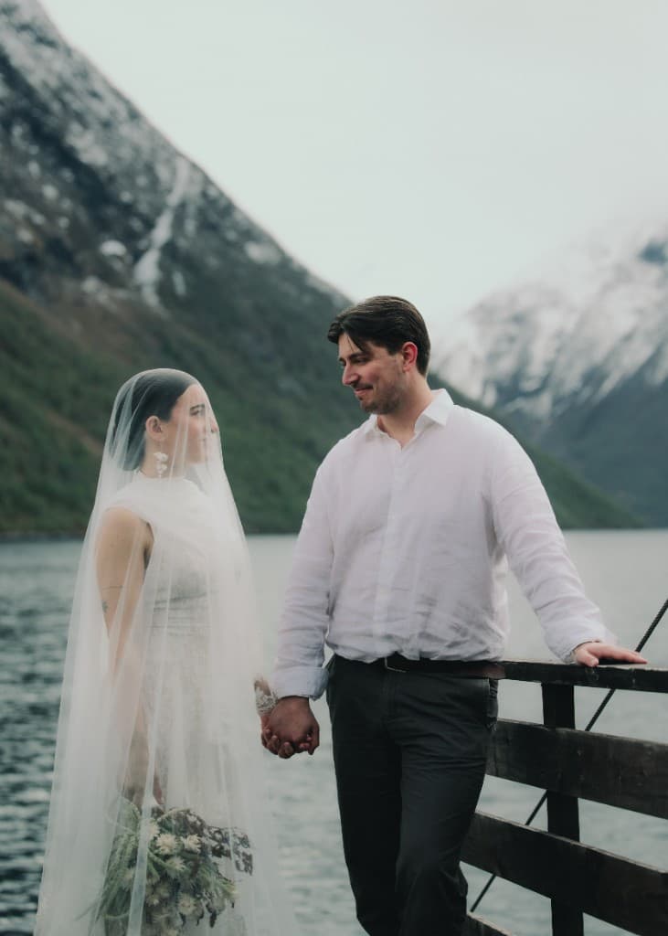 Styled wedding shoot — couple on a pier in Stranda